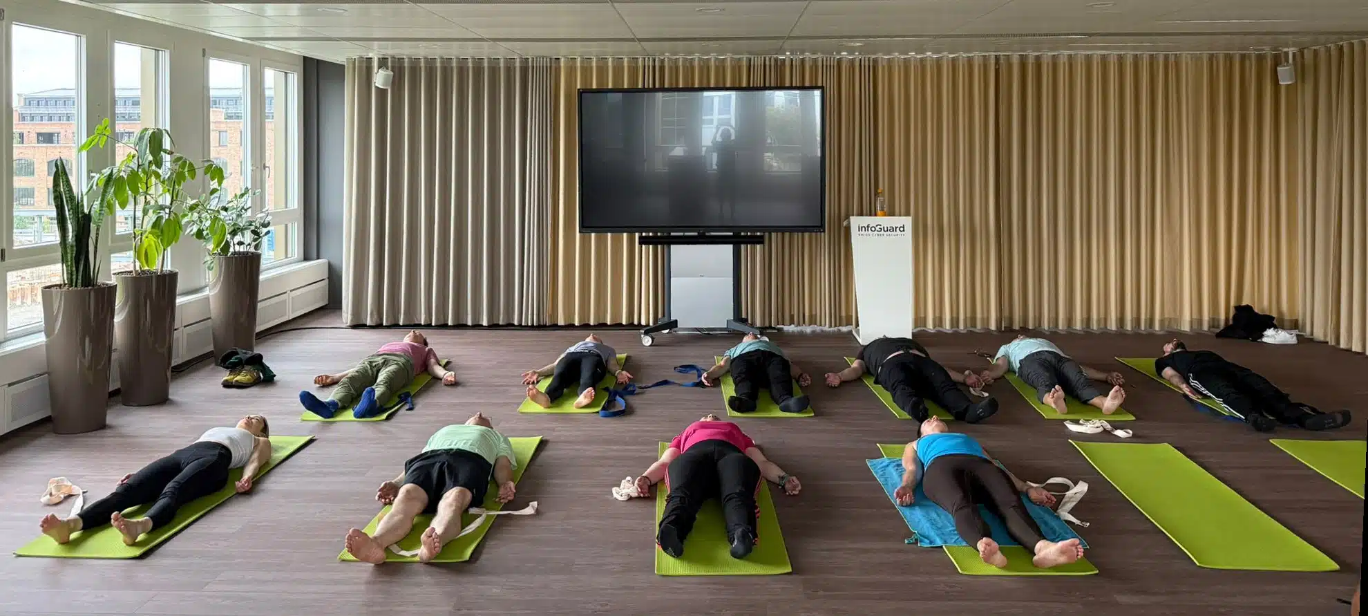 Business person holds a glowing brain hologram in their hands - symbol for mental recovery, sleep optimization and regeneration with Smiling Wisdom